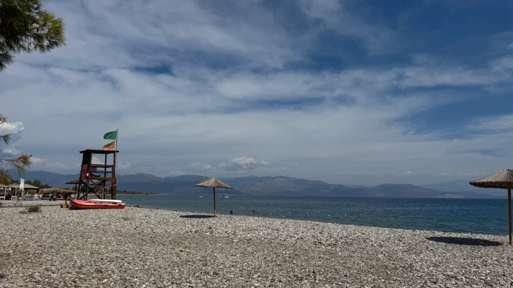 Rocky beaches, chairs and tranquil waters